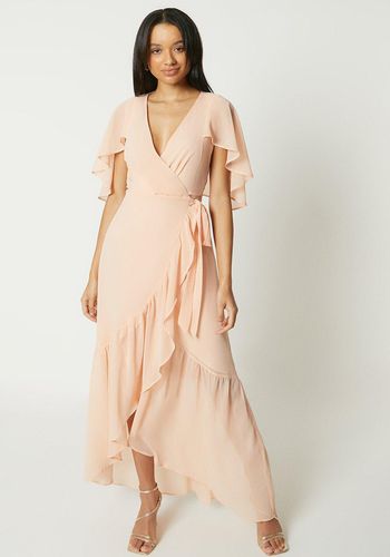 Peach bridesmaid dress with ruffle hem and cape sleeves from Debut London