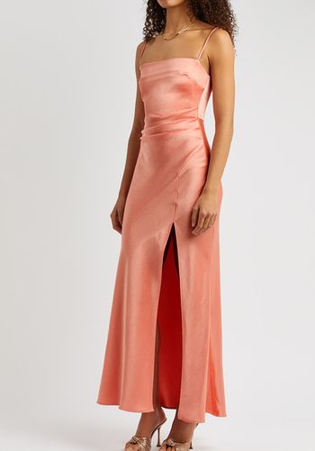 Coral peach bridesmaid dress from Bec &amp; Bridge/ Harvey Nichols with maxi satin design and leg split 