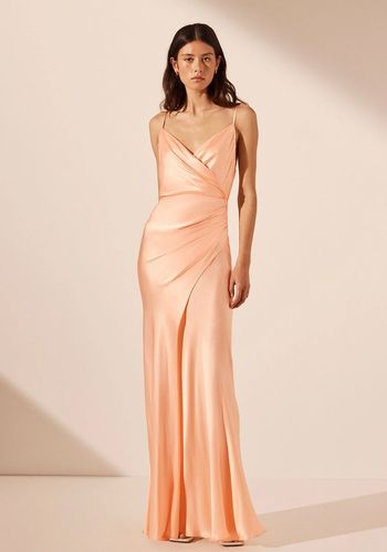 Peach bridesmaid dress from Shona Joy/ Revolve with satin material and draped maxi design 