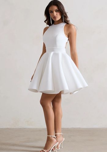 White mini dress with racer neckline and backless design from Club L London