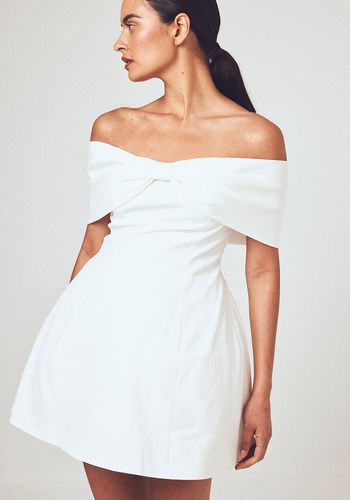 Short alternative wedding dress idea with bardot bow neckline from NA-KD