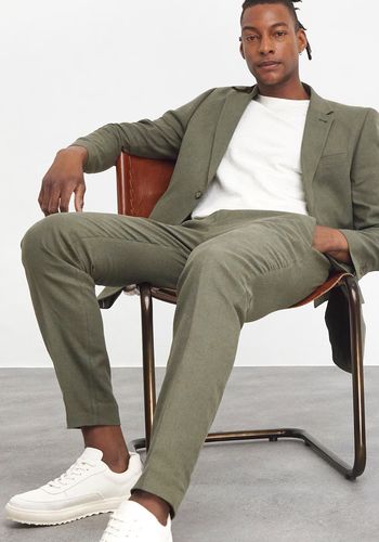 Casual wedding guest outfit idea for men from Jacamo - casual linen suit in khaki green