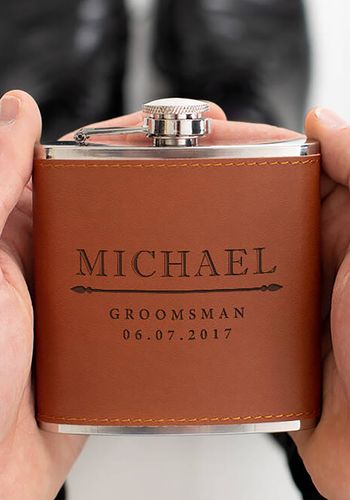 Groomsmen gift idea from Not On The High Street - brown personalised hip flask with name and date 