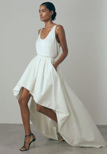 Two piece wedding dress from Reiss with high-low skirt for beach weddings