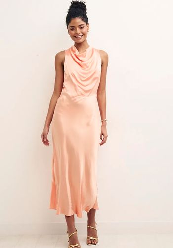 Peach satin bridesmaid dress with draped neckline from Nobody's Child