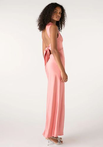 Pink peach bridesmaid dress from Omnes with maxi length and open tie back design 