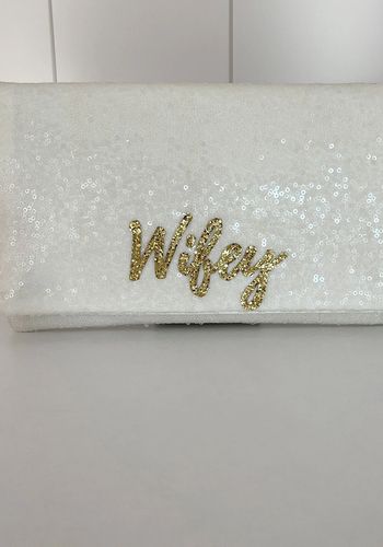 Sequin bridal clutch from Liberty in Love with &quot;wifey&quot; embroidered on the front