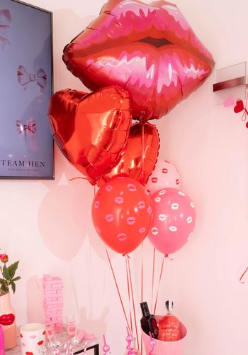 Red and pink lip shaped balloons for hen parties from Team Hen