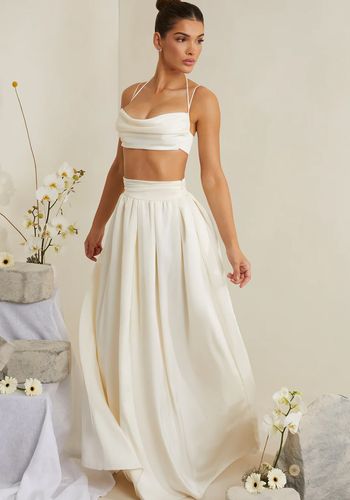 Bridal two piece wedding dress from Oh Polly with bralette style cropped top and maxi floor-length skirt