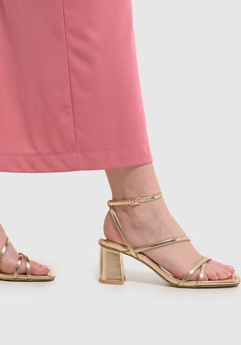 schuh-sully-strappy-block-gold-high-heels.jpg