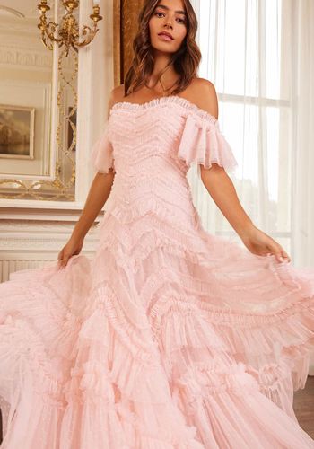 off-the-shoulder pink princess wedding dress with layers of soft tulle and frills