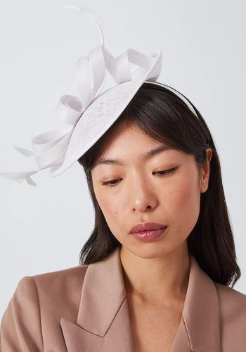 ivory disk bridal hat, fascinator with swirl detail.