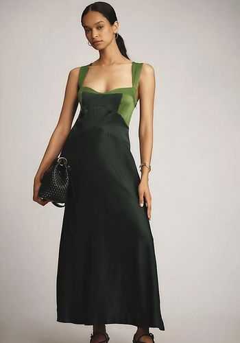 Green autumn wedding guest dress from Anthropologie