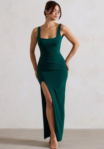 Green maxi wedding guest dress with square neckline, low back and thigh split 