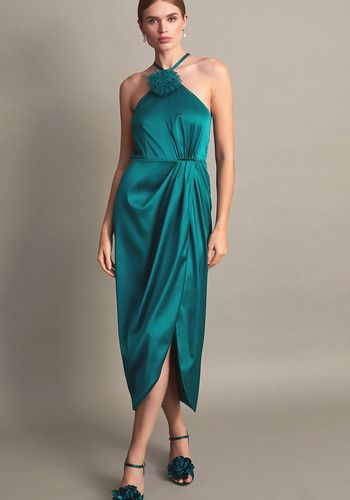 affordable bridesmaid dress from monsoon in satin teal, with halter silhouette, and an optional corsage