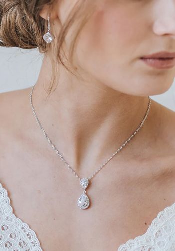 crystal bridal pendant necklace made from pear-cut crystals, each edged with tiny stones on a delicate chain.