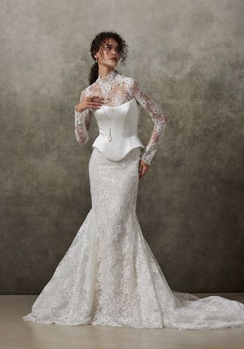 Strapless trumpet wedding dress with long sleeve high neck bolero and waist cincher