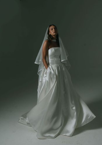 drop waist wedding dress with strapless neckline, boned bodice, thin belt and full skirt