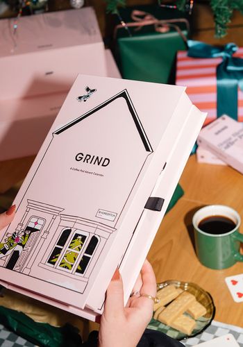 grind coffee advent calendar, including 26 home-compostable pods in 13 different blends.