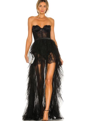 black wedding dress idea from revolve with boned bodice with underwire cups, and tiered ruffled tulle hem