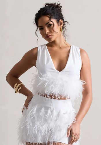 matching bridal separates set from Club L London, including plunge crop top and shorts with feather accents