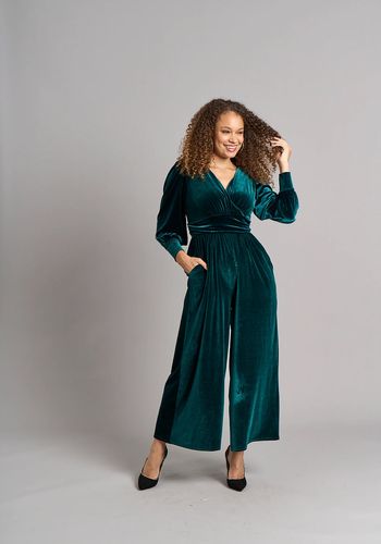  soft plush velvet wedding guest jumpsuit in a luxurious green tone