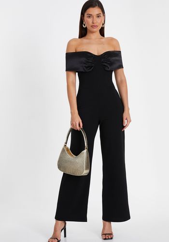 black bardot wedding guest jumpsuit with satin detail.