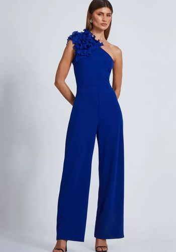 blue wedding guest jumpsuit with ruffled, one shoulder design.