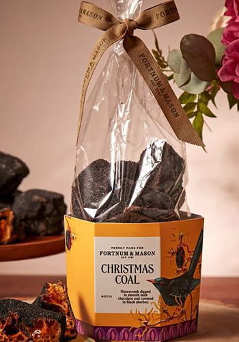 christmas coal made from toffee dipped in smooth milk chocolate and covered in black lemon sherbet.