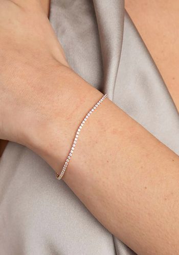 delicate, sparkly tennis chain bracelet in gold for brides