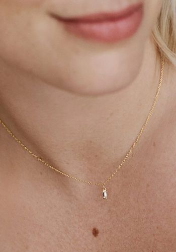 dainty necklace for brides, featuring lab-grown baguette diamond hung on a delicate 14ct solid gold chain.