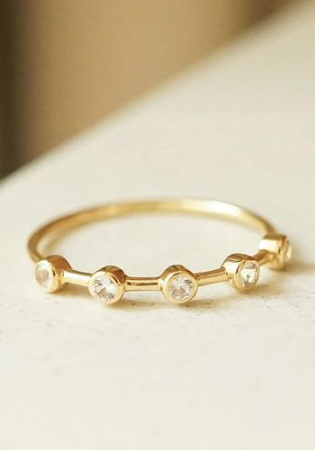 delicate gold ring for brides, featuring five round white sapphires set on 14ct solid gold