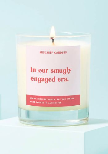 candle as funny engagement gift idea, featuring text: 'in our smugly engaged era'