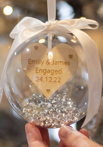 personalised christmas bauble with names and date as engagement gift idea