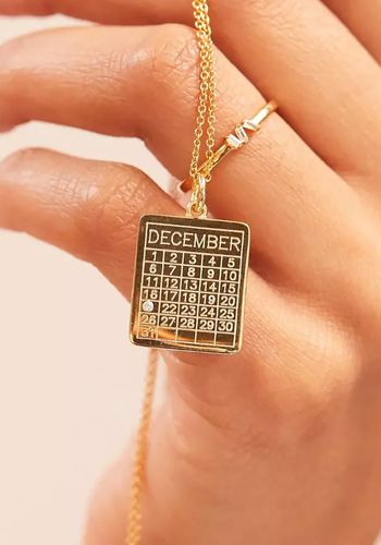 gold calendar necklace for special dates