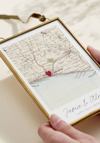 personalised vintage style map picture with a hand stitched red heart for anniversary gift