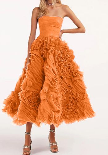 orange wedding dress with tulle floral full skirt and bandeau neckline.