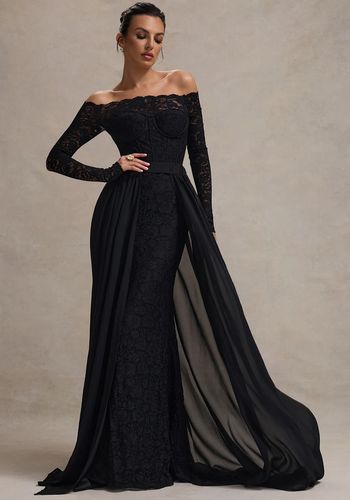 black wedding dress with bardot neckline and long, sheer sleeves, boned corset bodice, and removable chiffon skirt.