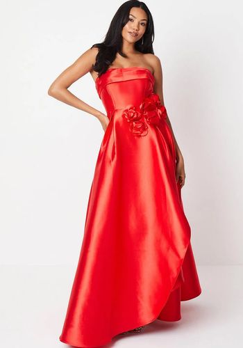 red wedding dress made from premium twill fabric with floor-length A-line skirt and corsage detail.