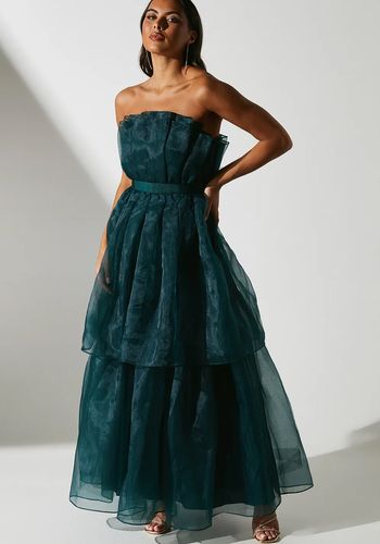 green wedding dress with voluminous tiered skirt in organza fabric