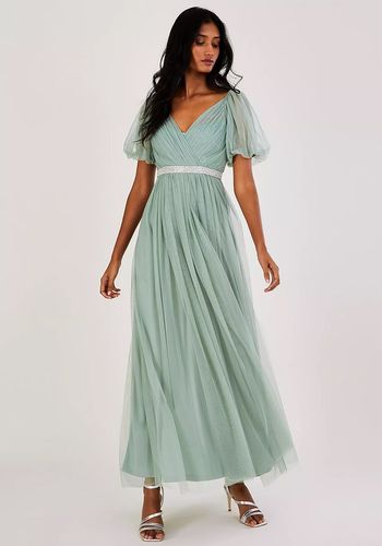 sage green wedding dress with v-neckline and short puffy sleeves.