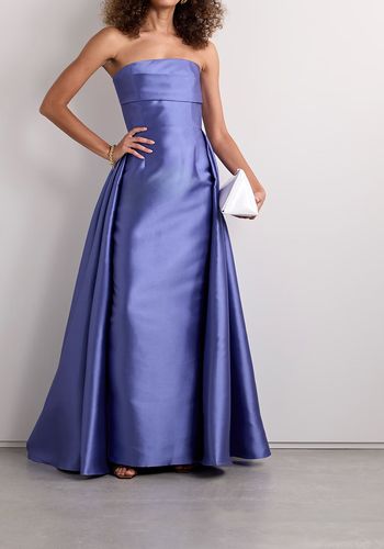 purple wedding dress in satin-twill, featuring strapless column silhouette and voluminous train that that extends off the hips. 