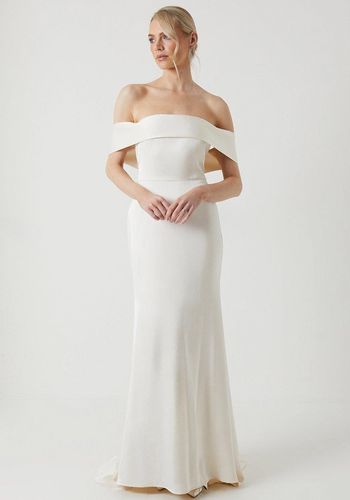 satin wedding dress with off-the-shoulder bardot neckline, fishtail skirt and dramatic train