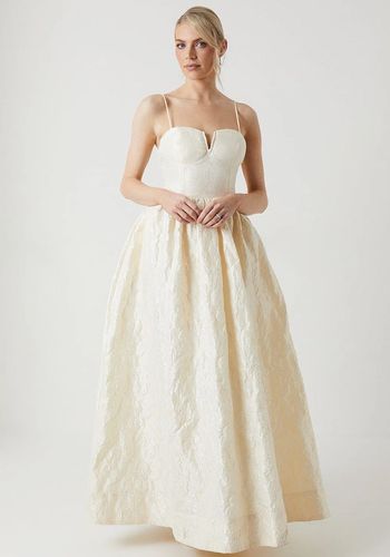 ballgown style wedding dress, featuring corset-style bodice, sweetheart neckline, jacquard fabric and full skirt