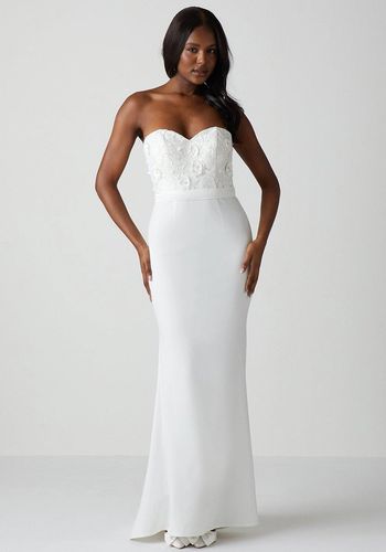 wedding dress from Coast, featuring a sweetheart neckline, floral embellished bodice, and mermaid skirt.