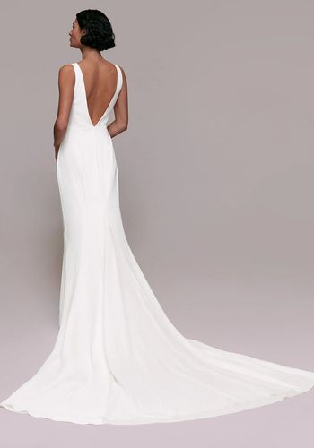 wedding dress with  V neckline, fluted hem and a statement court train