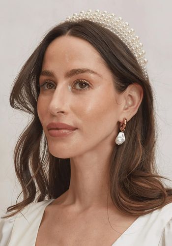 structured Alta Headband with rows of varying-sized pearls set onto a puffy oyster satin headband