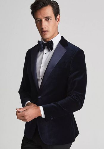 single-breasted navy velvet dinner jacket, with contrasting satin trim