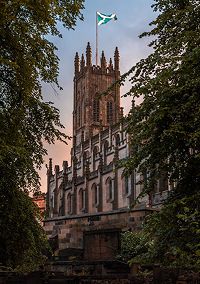 Historic Edinburgh cityscape with castle and surrounding architecture in Scotland