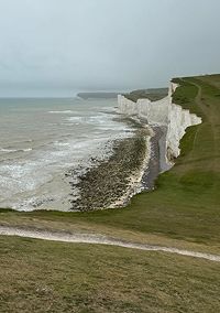 White chalk cliffs and coastal path along the South East England coastline